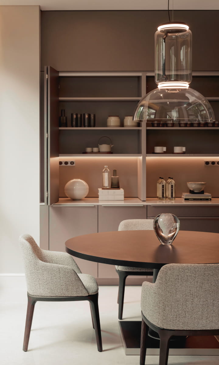 Refined dining room with pendant lighting at Eden